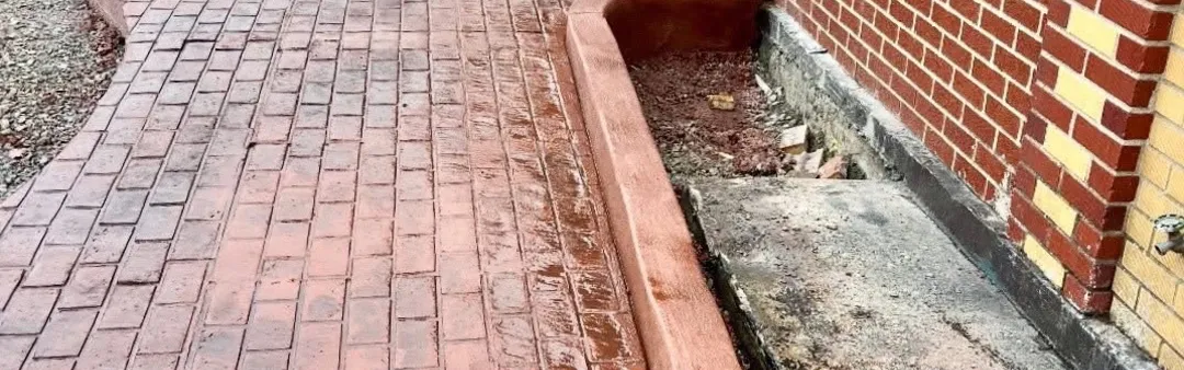 Stamped concrete walkway by B&B